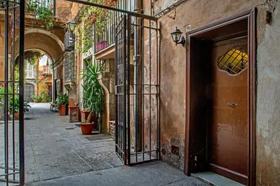an entrance to a building with an open door at Trastevere Apartments in Rome