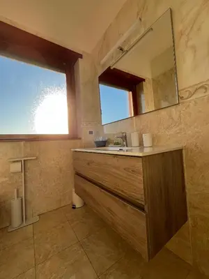 a bathroom with a sink and a mirror at Residenza 
