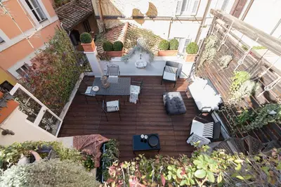 an overhead view of a patio with furniture and plants at Loft&Terrace - Elevated Elegance at Navona in Rome