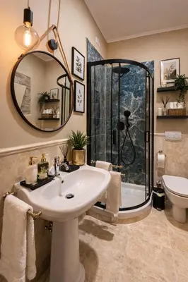 a bathroom with a sink and a shower with a mirror at Suites Piazza Del Popolo in Rome