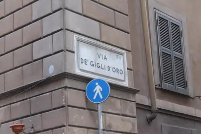 a street sign on the side of a building at Il Nido in Rome
