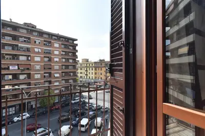 a view from a window of a parking lot at Mondrian House in Rome