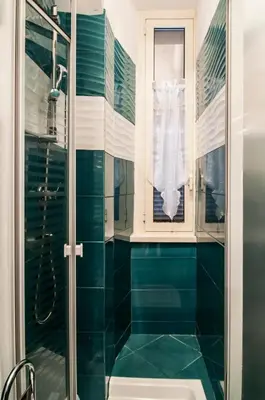 a bathroom with a shower and a sink at Rome Best Rent in Rome