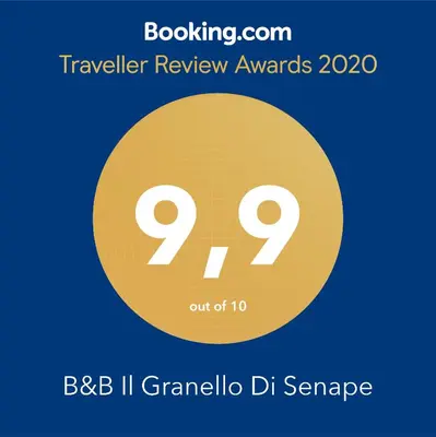 a yellow circle with the number on it at B&B Il Granello Di Senape in Rome