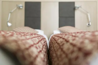 two close up of the backs of two chairs at Hotel Casa Valdese Roma in Rome