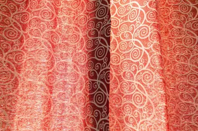 a close up of a red and white curtain at Hotel Casa Valdese Roma in Rome