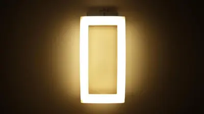 a close up of a lit up emergency light at SuiteLifeTrevi in Rome