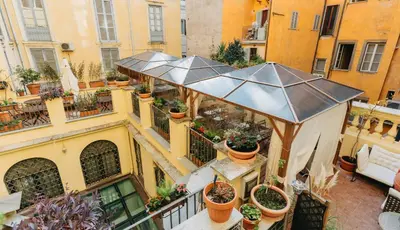 an overhead view of a balcony with potted plants at Le Clarisse Pantheon in Rome