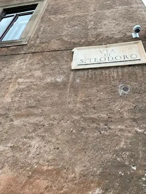 a sign on the side of a building at Foro Romano Apartments B in Rome