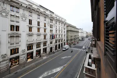 a view of a city street with buildings at Maison Tritone in Rome