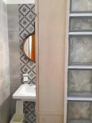 a bathroom with a sink and a mirror at DAB Guest House in Rome
