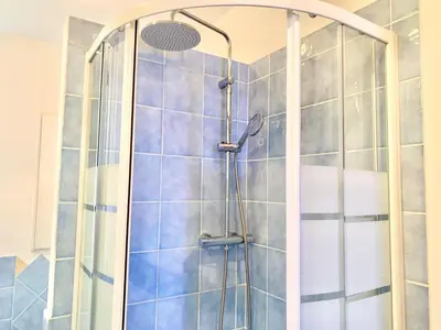 a shower with a glass door in a bathroom at DaliTourism - Vatican Apartment 9 in Rome