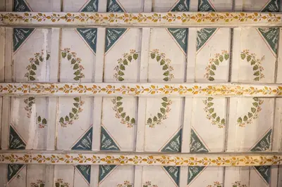 a close up of a tile wall with gold trim at Casa Fabbrini Fancy Suites in Rome