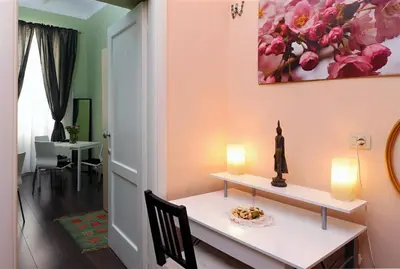 a dining room with a table with two candles on it at B&B Alexander in Rome