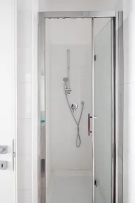a shower with a glass door in a bathroom at La Terrazza a San Pietro in Rome