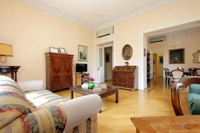 a living room with a couch and a table at Vatican House Via Terenzio in Rome