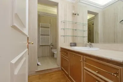 a bathroom with a sink and a toilet at Vatican House Via Terenzio in Rome