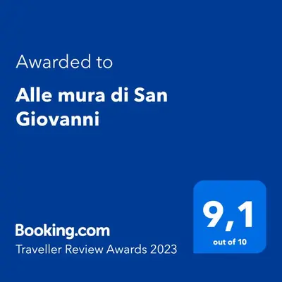 a screenshot of a phone with the text awarded to all muna dh samchev at B&B Alle mura di San Giovanni in Rome