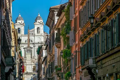 a view of an alley between buildings at Riccardo Condotti Suite in Rome