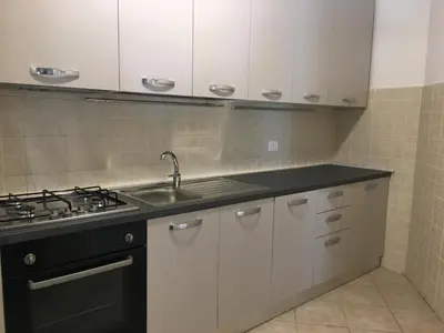 a kitchen with a sink and a stove at B&B CultRoma Roof Garden in Rome
