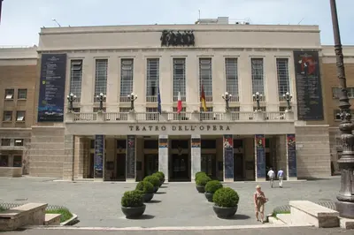 a building with a sign that reads teria blucchini at Roma Vespahouse in Rome