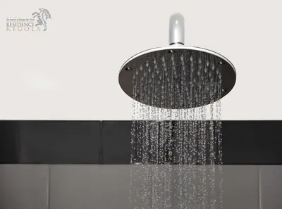 a shower with water coming out of it at Residence Regola in Rome