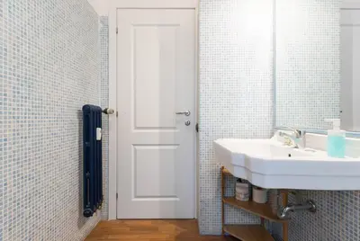 a bathroom with a sink and a mirror at Be Rome in Rome