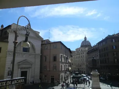 a city street with buildings and a street light at Hotel Primavera in Rome