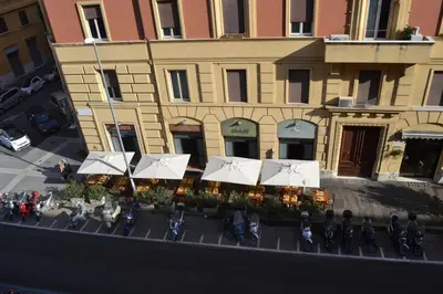 an overhead view of a building with white umbrellas at Hotel Al SanPietrino in Rome