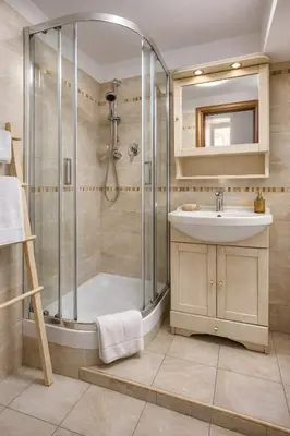 a bathroom with a shower and a sink at Urbana 37 Maison - Rione Monti by RHR in Rome