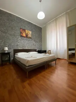 a bedroom with a bed in a room at The Place In Rome Guest House in Rome