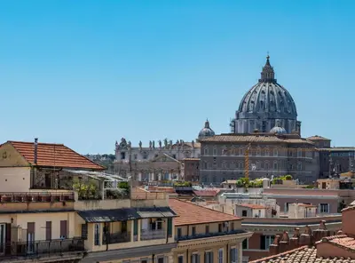 a view of a city with a domed building at Hotel Relais Dei Papi in Rome