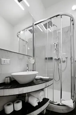 a bathroom with a sink and a shower at Il Fascino Di Roma in Rome