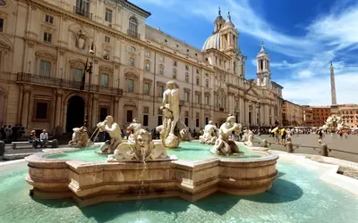 a water fountain in front of a building at Hotel Fiorenza in Rome