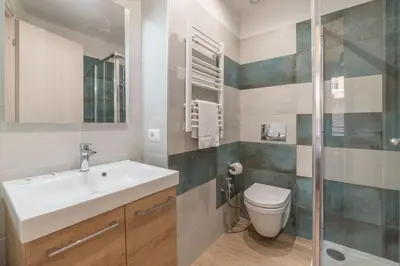 a bathroom with a sink and a toilet at Roma Station House in Rome