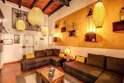 a living room with two couches and a table at La Scala in Rome