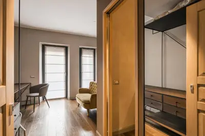 a hallway with a living room and a dining room at The Place in Rome