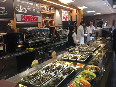 a buffet line with a lot of food on display at Casa Camilla in Rome