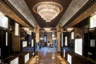 a large hallway with a chandelier and a lobby at The Style in Rome