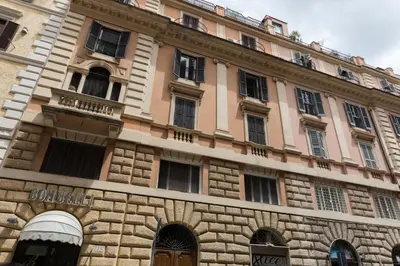 a large building with many windows on the side of it at ROMAC Villa Borghese with 3 bedrooms near Via Veneto in Rome