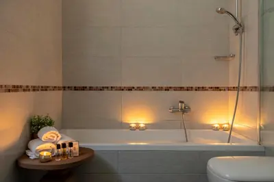 a bathroom with a tub and a toilet and a sink at ROMAC Mazzini with 5 bedrooms near the Vatican in Rome