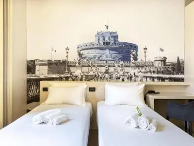 two beds in a room with a picture of a cruise ship at B&B Hotel Roma Trastevere in Rome