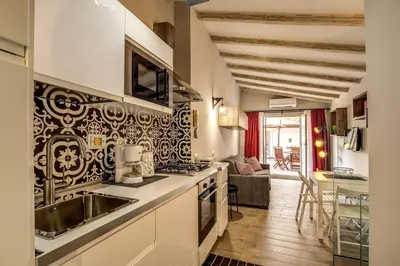 a kitchen with a sink and a counter top at Attic with Terrace by Trevi Fountain in Rome