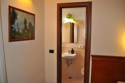 a bathroom with a sink and a mirror at Paramount in Rome