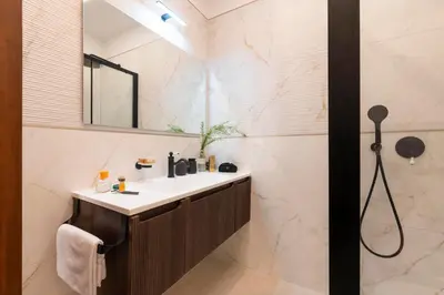 a bathroom with a sink and a shower at Antica dimora navona in Rome