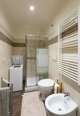 a bathroom with a toilet and a sink at Domus Caracalla Nel Cuore Di Roma in Rome