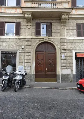 two motorcycles parked in front of a building at GH Colosseum in Rome
