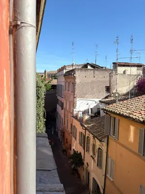 a group of buildings with windows and balconies at LeopardElla in Rome