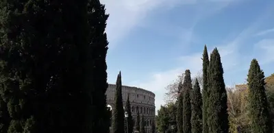 a building with a bunch of trees in front of it at Emanuela Guest House in Rome