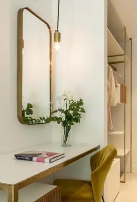 a dressing table with a mirror and a chair at Horti 14 Borgo Trastevere Hotel in Rome